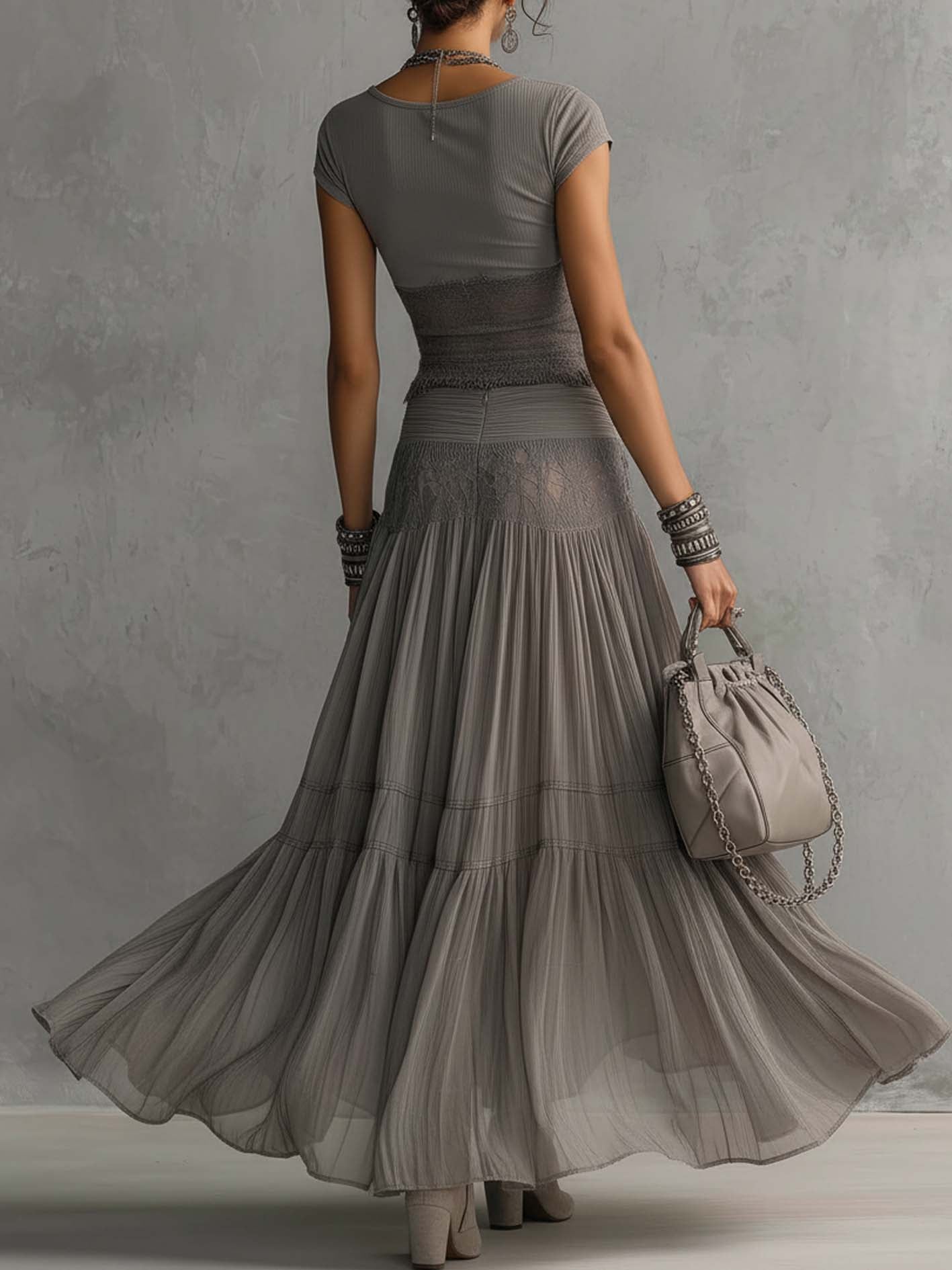 Geneva | Set consisting of a transparent top with black lace panels and a maxi pleated skirt